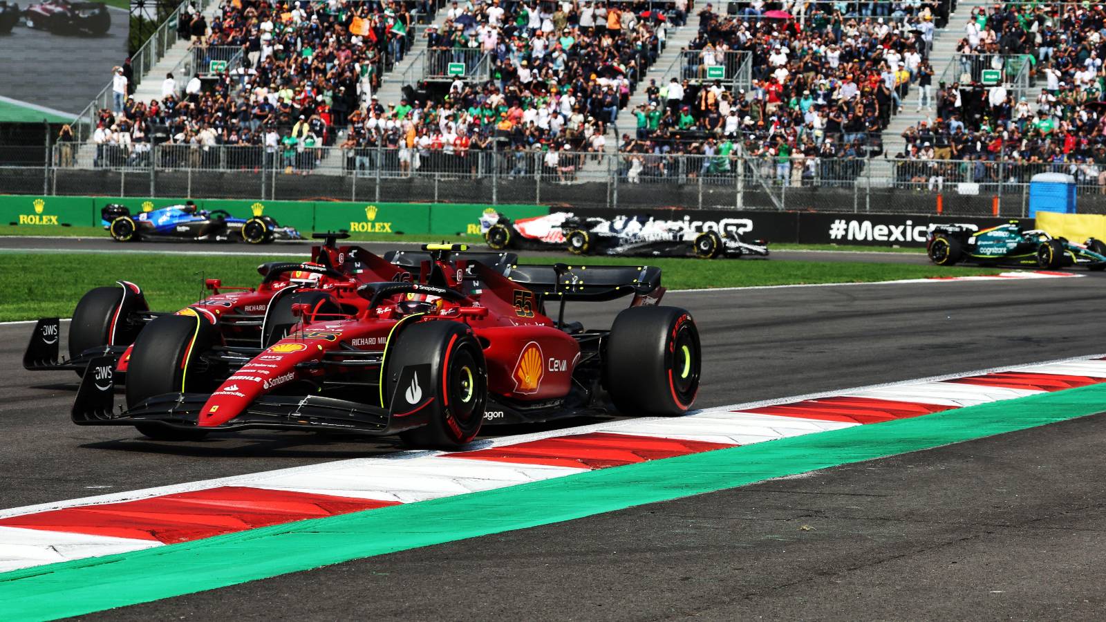 Carlos Sainz and Charles Leclerc, Ferrari, race close together. Mexico, October 2022.