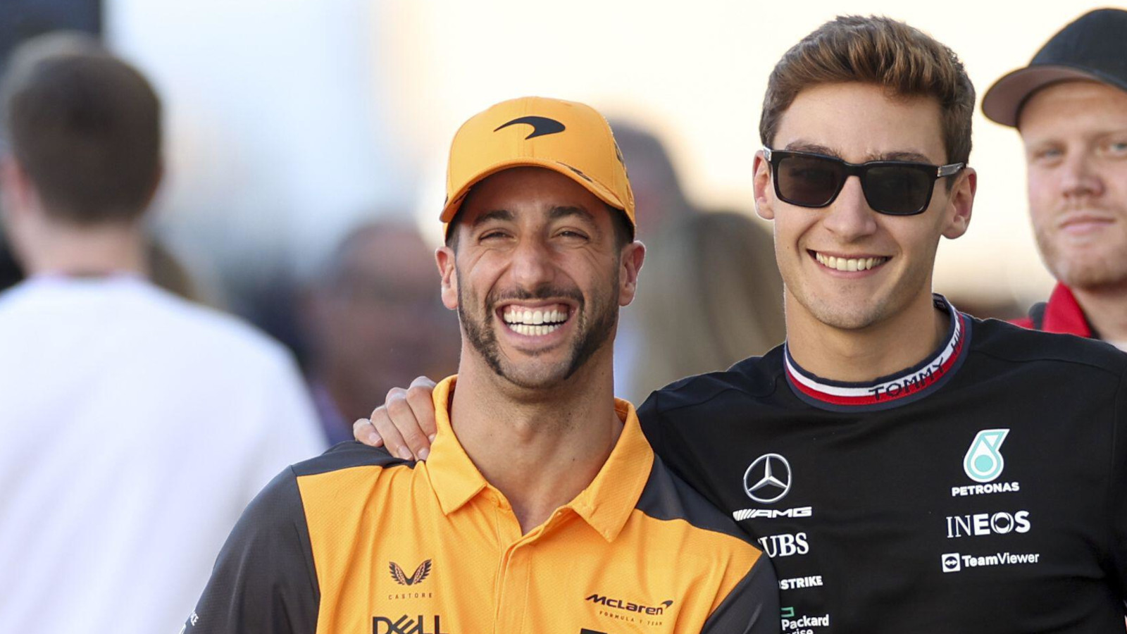 George Russell gives Daniel Ricciardo's shoulder a squeeze. Austin October 2022
