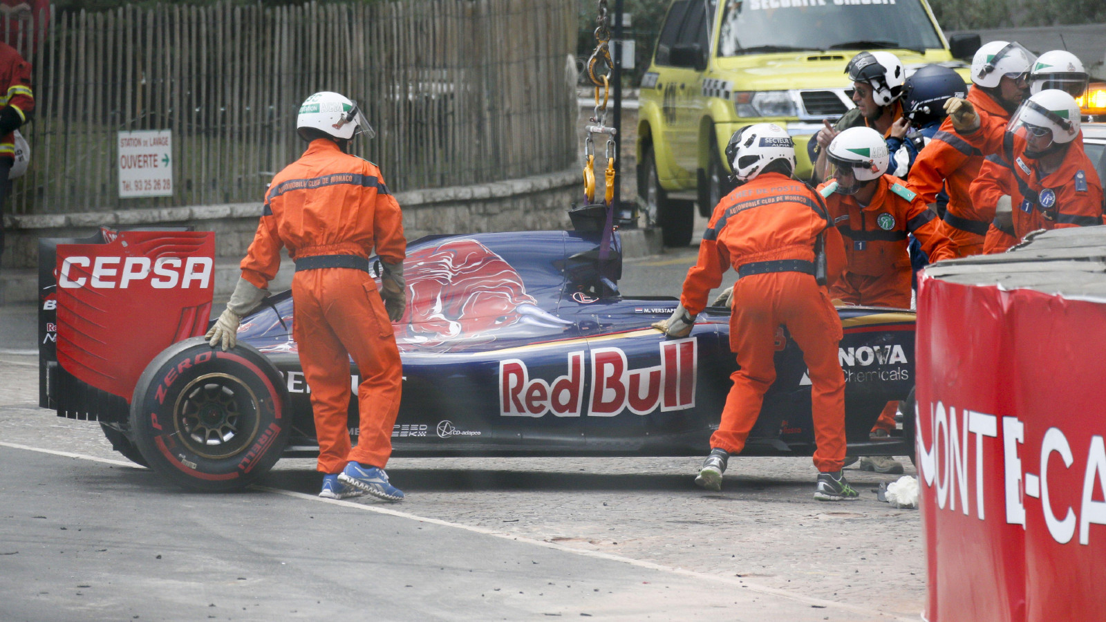 Toro Rosso's Max Verstappen's car is removed from the barriers after a crash. Monte Carlo, May 2015.