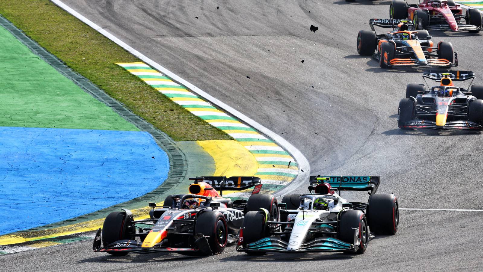 Lewis Hamilton and Max Verstappen collide at the Sao Paulo GP. Interlagos November 2022.