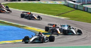 Max Verstappen and Lewis Hamilton collide. Brazil, November 2022.