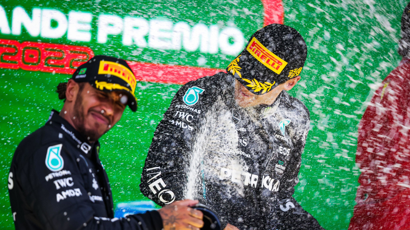 George Russell and Lewis Hamilton spray champagne, Mercedes' first 1-2 of the season. Brazil November 2022