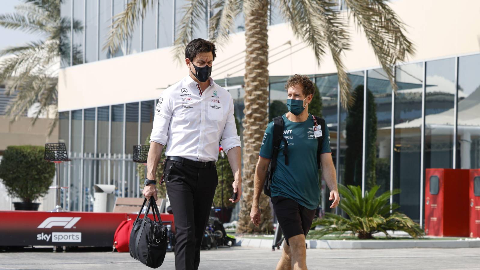 Toto Wolff, Sebastian Vettel walk and talk. Abu Dhabi, December 2021.