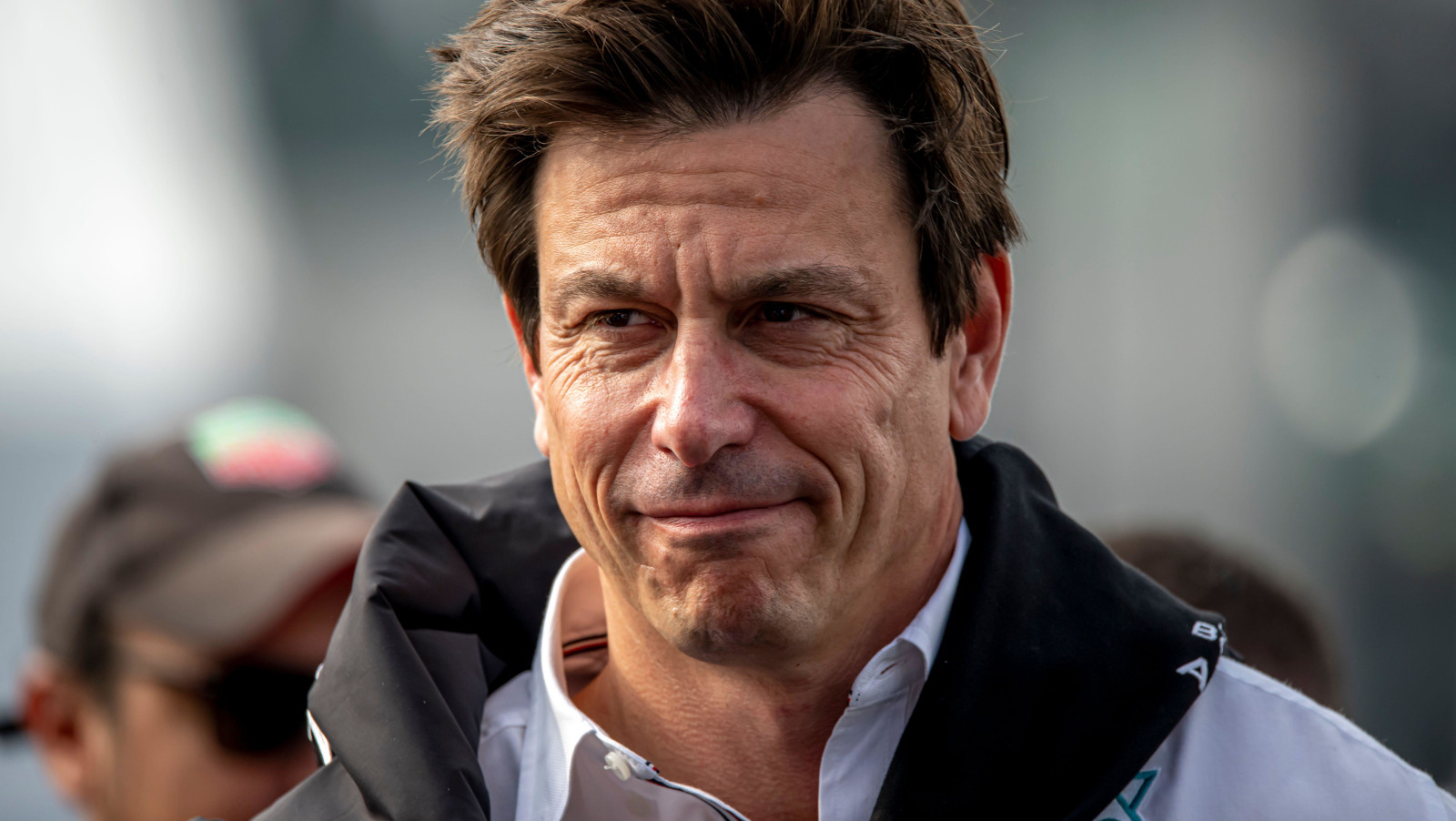Toto Wolff with a jersey around his shoulders and a smile. Mexico October 2022