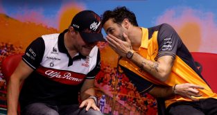 Daniel Ricciardo whispering to Valtteri Bottas. Austria July 2022