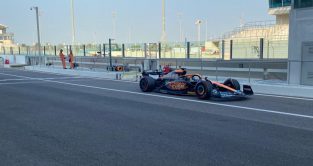 McLaren's Oscar Piastri in the pits at Abu Dhabi testing. Yas Marina, November 2022.