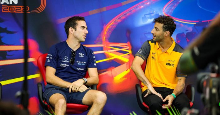 Daniel Ricciardo talking with Nicholas Latifi. Spa-Francorchamps August 2022.