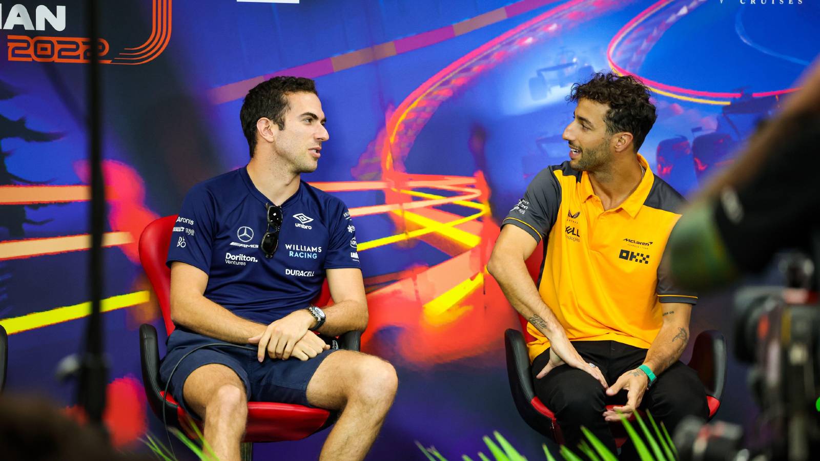 Daniel Ricciardo talking with Nicholas Latifi. Spa-Francorchamps August 2022.