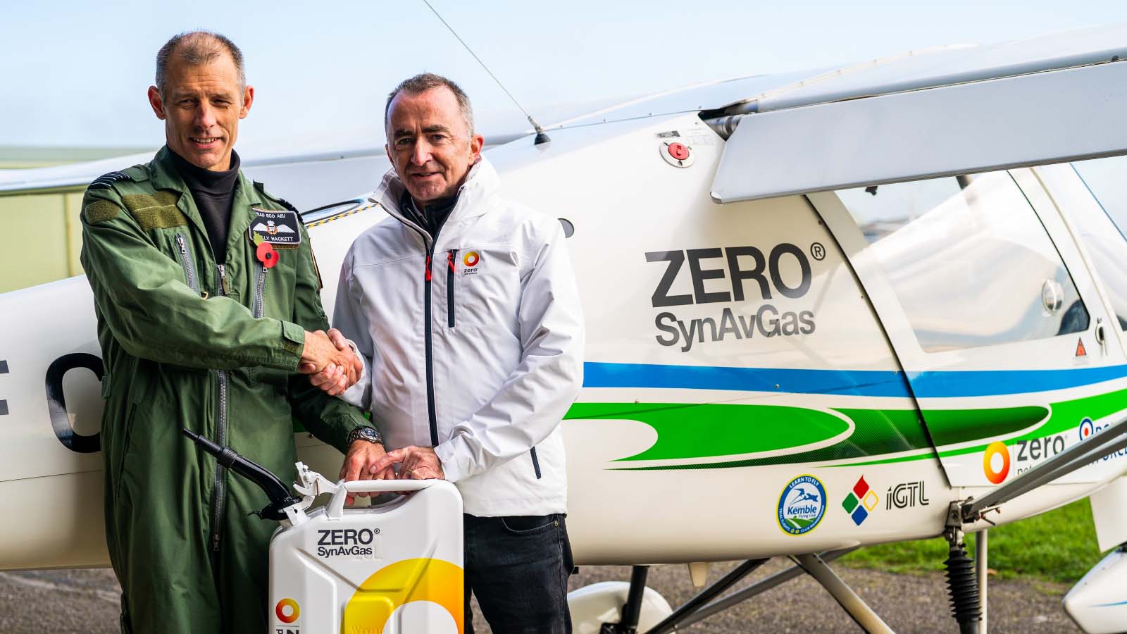 Paddy Lowe shakes hands ahead of Zero Petroleum's first sustainable fuel-powered flight. RAF Kemble November 2021.