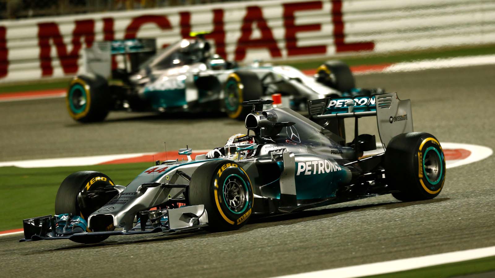 Lewis Hamilton leads Nico Rosberg. Bahrain April 2014.