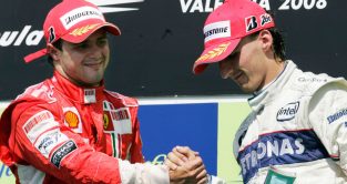 Felipe Massa shakes hands with Robert Kubica. Valencia August 2008
