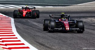Ferrari following Alfa Romeo. Bahrain, February 2023.