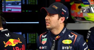 Sergio Perez staring in the Red Bull garage. Bahrain February 2023