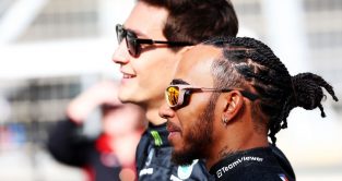 George Russell and Lewis Hamilton smiling in pre-season photo call. Bahrain February 2023