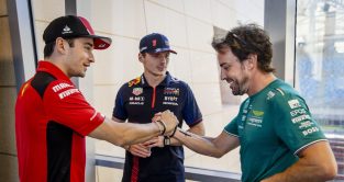 Charles Leclerc greets Fernando Alonso with Max Verstappen also in the photo. Bahrain March 2023