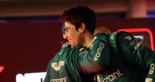 Lance Stroll hugs Fernando Alonso after his podium finish. Bahrain March 2023.