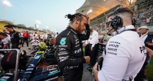 Lewis Hamilton talks to his race engineer Peter Bonnington on the grid before the Bahrain Grand Prix. Bahrain March 2023