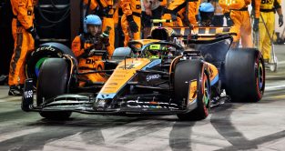 Lando Norris leaves the McLaren pit box. Bahrain March 2023.