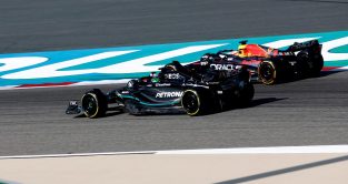 George Russell, Mercedes, alongside Max Verstappen, Red Bull. Bahrain March 2023.