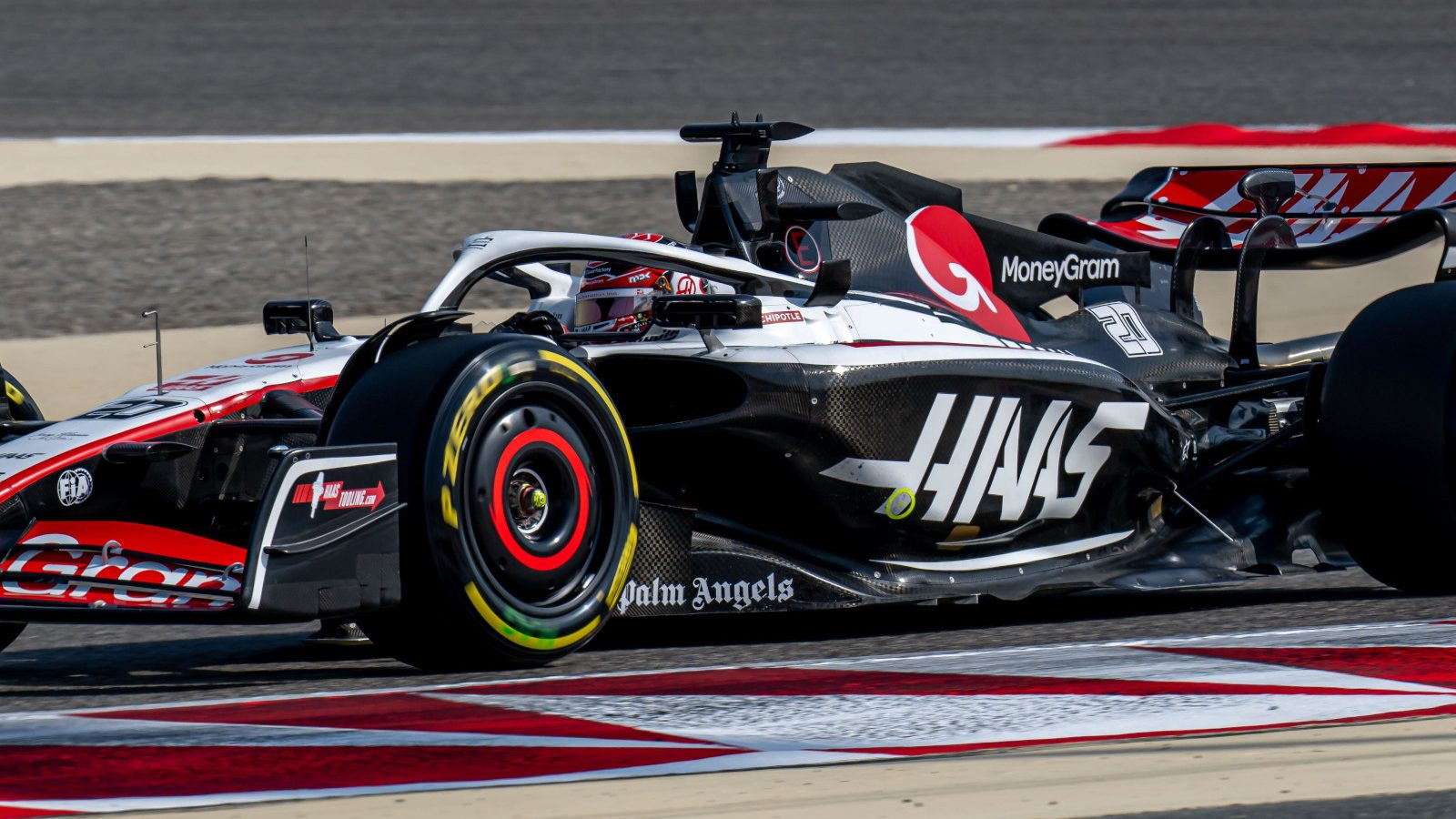 Kevin Magnussen in the Haas with the team logo showing. Bahrain March 2023