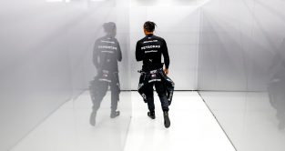 Lewis Hamilton walking down the tunnel out of the garage. Saudi Arabia March 2023
