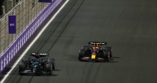 Mercedes' George Russell and Red Bull's Max Verstappen battle at the Saudi Arabian Grand Prix. Jeddah, March 2023. David Croft