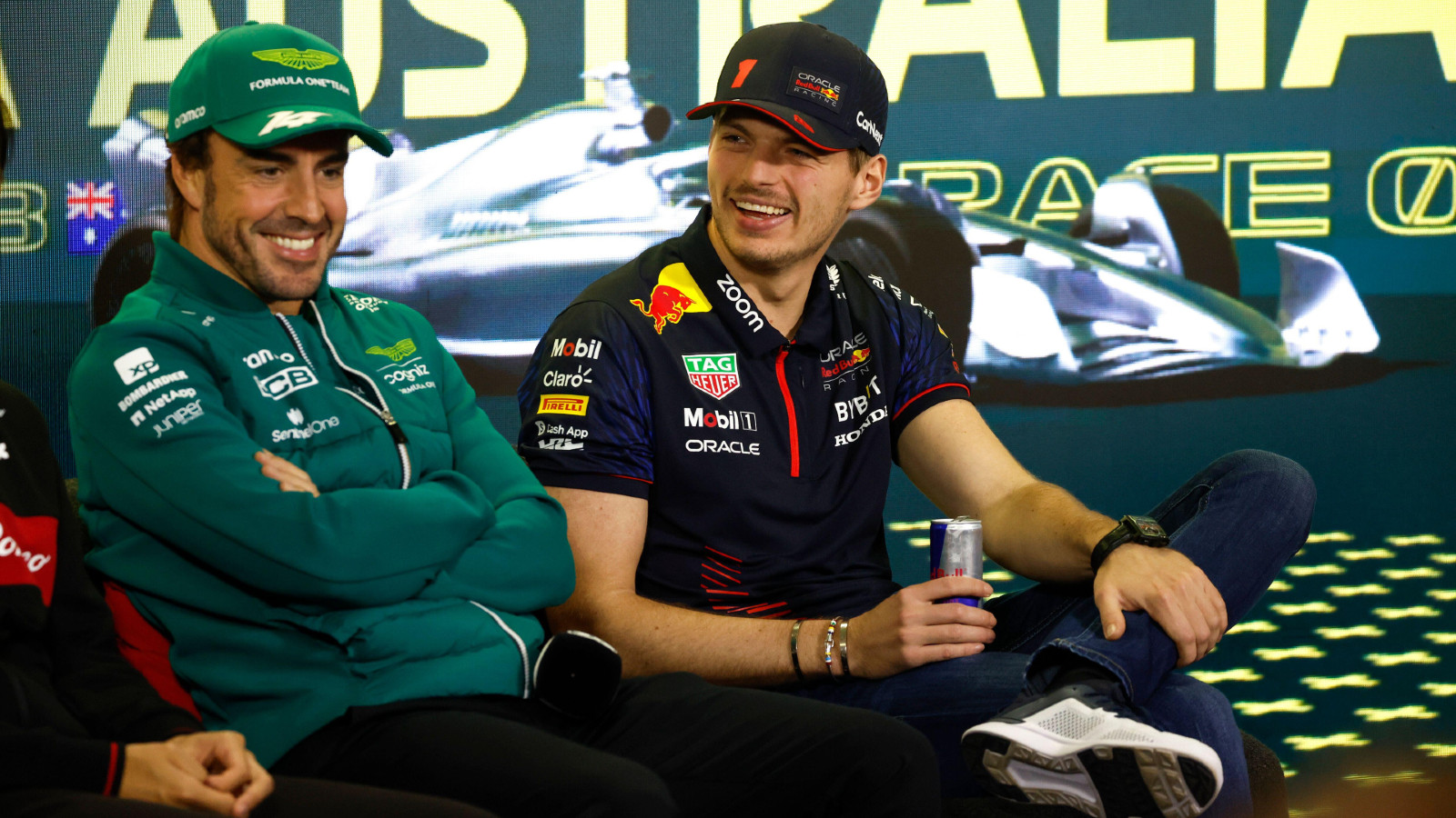 Aston Martin's Fernando Alonso jokes with Red Bull's Max Verstappen at the Australian Grand Prix. Melbourne, March 2023.