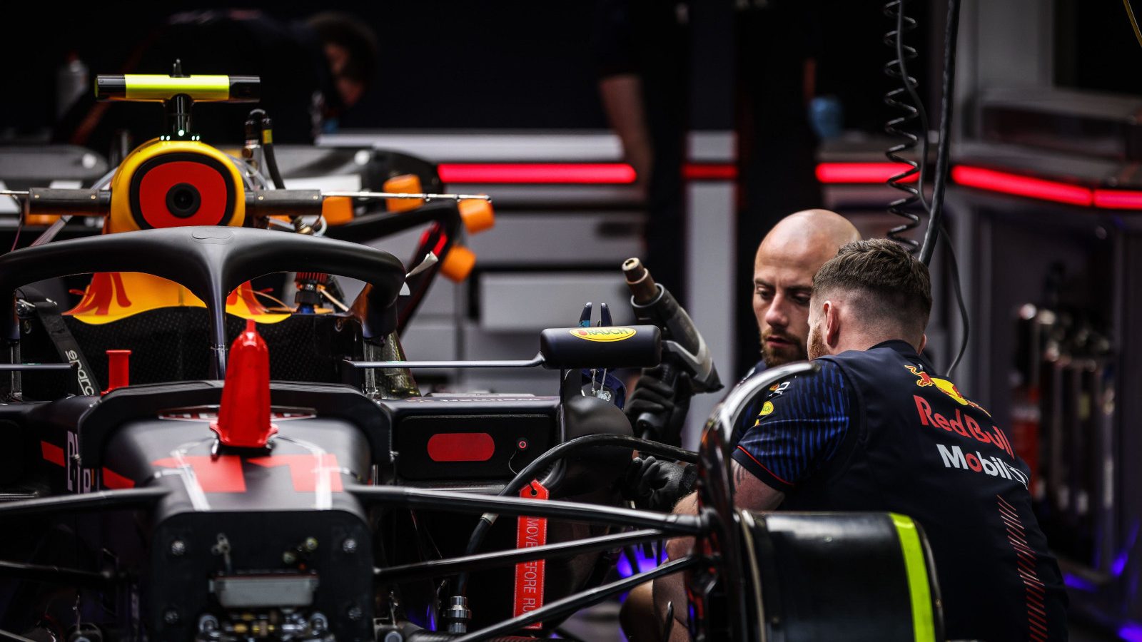 Red Bull RB19 stripped, mechanics working on the car. Australia March 2023