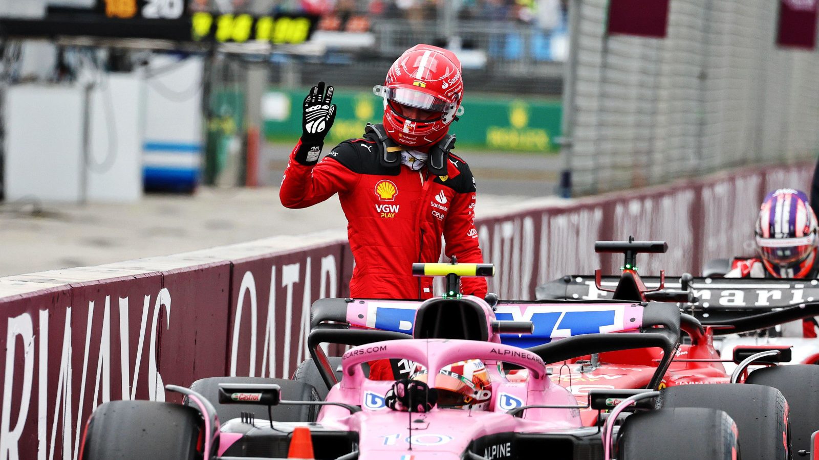 Charles Leclerc waves while walking from his car in parc ferme. Australia April 2023