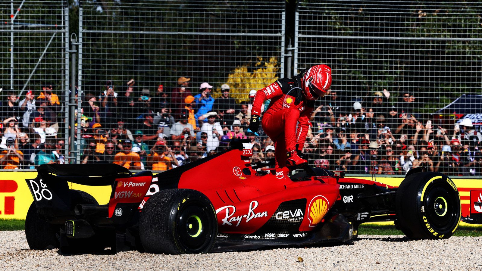 Charles Leclerc climbs out of his beached SF-23. Australia April 2023