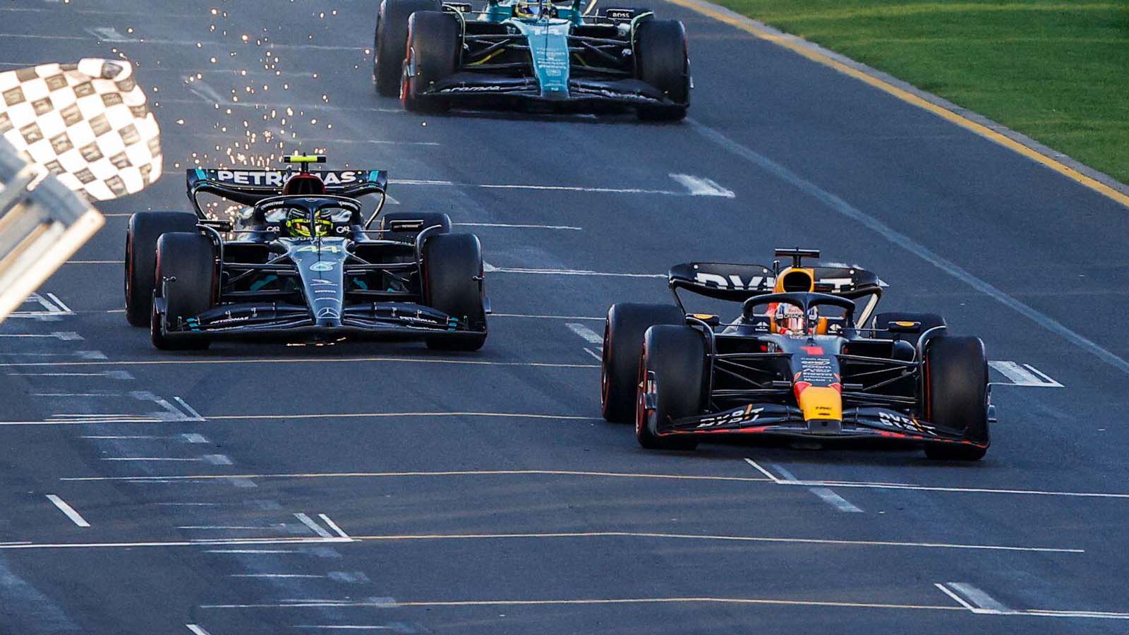 Max Verstappen leads Lewis Hamilton over the line. Formula 1 Australia April 2023.