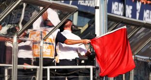 The red flag is waved from the gantry. Melbourne April 2023.