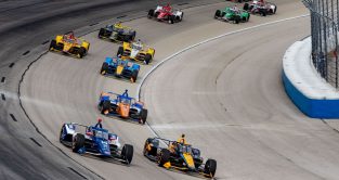 The IndyCar field circulates at Texas Motor Speedway. Texas, 2023.