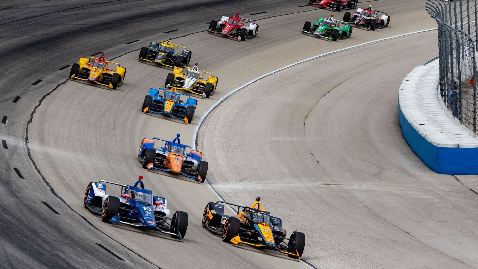 The IndyCar field circulates at Texas Motor Speedway. Texas, 2023.