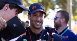 Daniel Ricciardo smiles with a fan. Australia April 2023.
