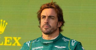 Fernando Alonso stands on the podium. Melbourne April 2023.