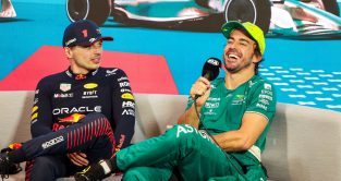 Fernando Alonso and Max Verstappen laughing in the post race press conference. Miami May 2023
