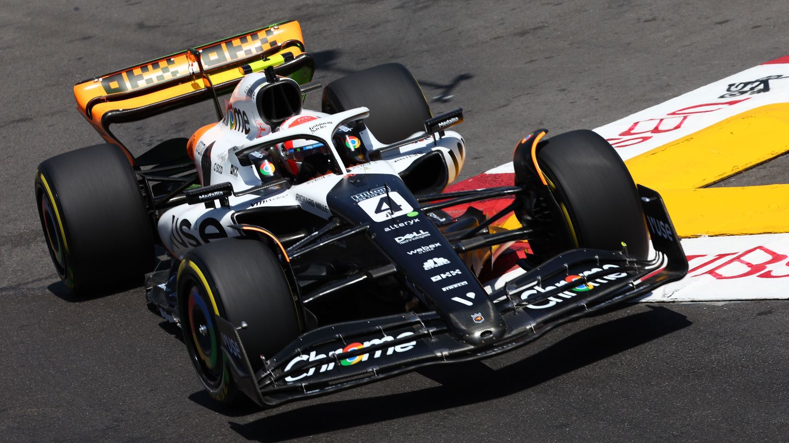 Lando Norris drives special-liveried McLaren. Monaco, May 2023.