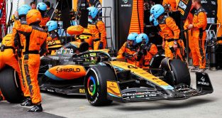 Lando Norris leaves his pit box after one of his pit stops. Canada June 2023.