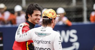 Carlos Sainz and Fernando Alonso hugs and smiles on the grid. Spain June 2023