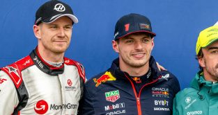 Nico Hulkenberg (Haas) and Max Verstappen (Red Bull) pose after qualifying in the top three for the Canadian Grand Prix. Montreal, June 2023.