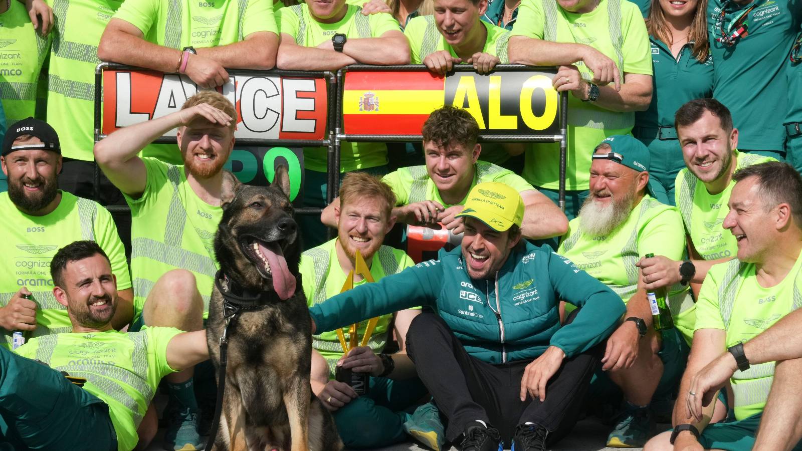 Sniffer dog joins Fernando Alonso and Aston Martin for a picture. Canada, June 2023.