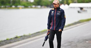 Sergio Perez walking to a wet Canada paddock. Montreal, Canada. June 2023