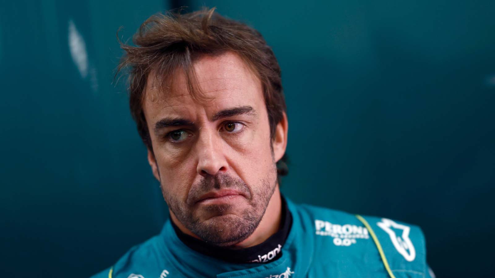 Fernando Alonso in the Aston Martin garage.
