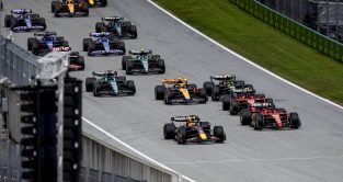 红牛车队的司机Max Verstappen leads into Turn 1 at the Austrian Grand Prix. Spielberg, July 2023. Time penalties