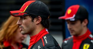 Carlos Sainz looks into the distance as Ferrari team-mate Charles Leclerc lurks in the background at the Austrian Grand Prix. Styria, July 2023.