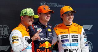 Max Verstappen (Red Bull) poses with McLaren drivers Lando Norris and Oscar Piastri after British Grand Prix qualifying. Silverstone, July 2023.