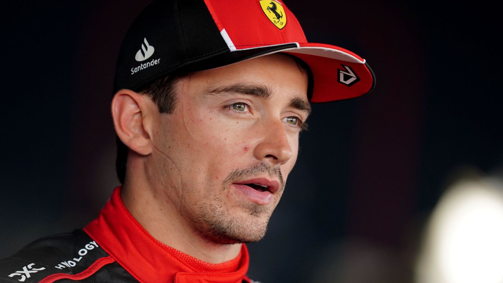 Ferrari driver Charles Leclerc speaks to the media after qualifying at the British Grand Prix. Silverstone, July 2023.