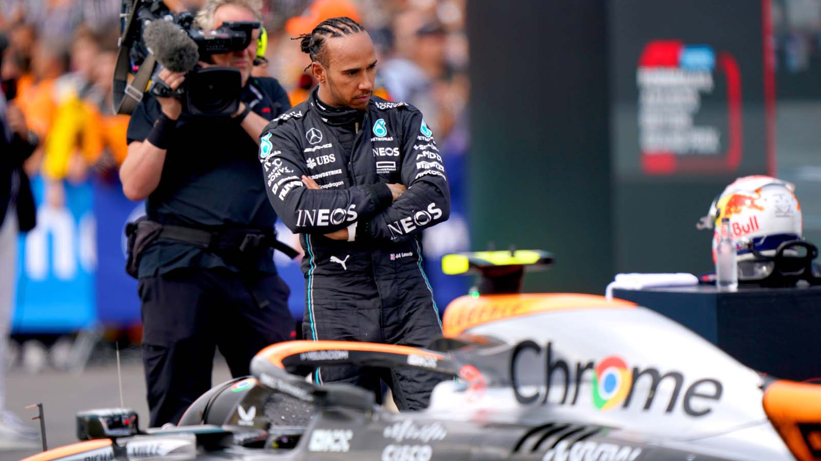Lewis Hamilton inspects the McLaren after the race. Silverstone July 2023.