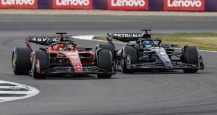 Charles Leclerc, Ferrari and George Russell, Mercedes, battle. England, July 2023.